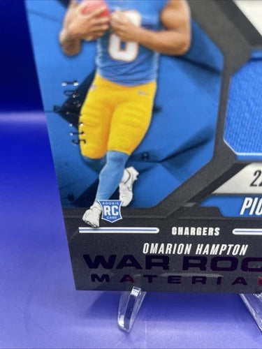 Omarion Hampton Panini Absolute Rookie Patch. /115